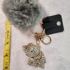 Gold Elephant Keychain with Gray Pom Pom